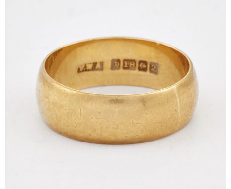 AN 18 CARAT GOLD BAND RING, hallmarked Birmingham 1990, ring size L1/2. 5.3 gramsCONDITION REPORTLight general wear.