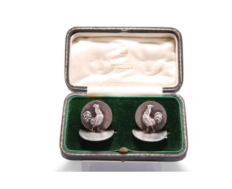 A PAIR OF EDWARDIAN SILVER MENU HOLDERS,&nbsp;by Sampson Mordan &amp; Co Ltd, Chester 1908, each cast with a cockerel against
