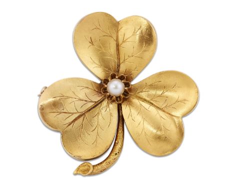 A VICTORIAN SPLIT PEARL CLOVER BROOCH, a split pearl in a high claw setting to the centre of a naturalistic clover, with two 