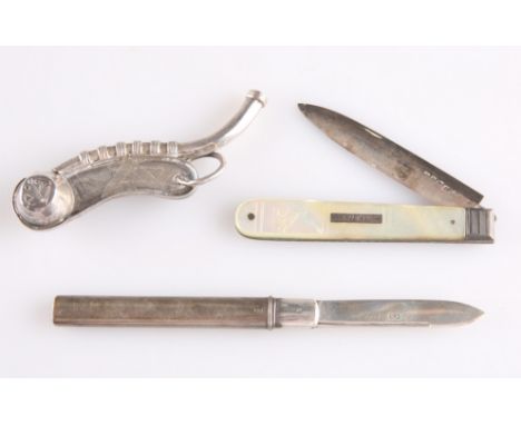 A GEORGE IV SILVER AND MOTHER-OF-PEARL FOLDING FRUIT KNIFE,&nbsp;by&nbsp;Thomas Sansom, Sheffield 1827, the handle carved wit