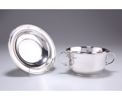 AN EDWARDIAN SILVER PORRINGER AND PLATE,&nbsp;by William Hutton &amp; Sons Ltd, Sheffield 1908 (porringer) and London 1908 (p