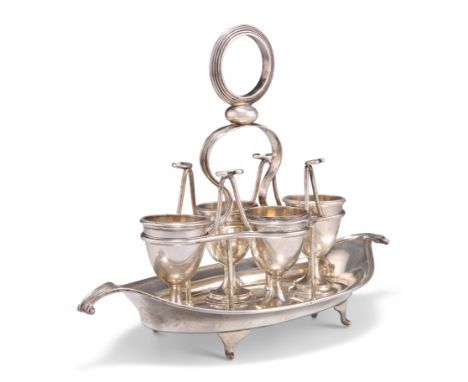 A GEORGE V SILVER EGG CRUET,&nbsp;by&nbsp;Elkington &amp; Co Ltd, London 1910, the boat-shaped stand with four bracket feet a