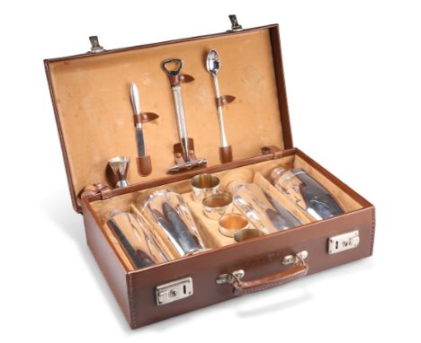 A VINTAGE LEATHER-CASED SILVER-PLATED TRAVELLING COCKTAIL SET, with various shakers, cups and accessoriesCONDITION REPORTRost