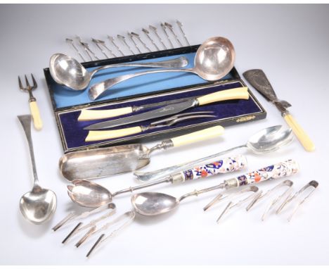 A GROUP OF PLATED WARES, including twelve pairs of asparagus servers, soup ladle, carving set, crumb scoop, etc. (Qty)