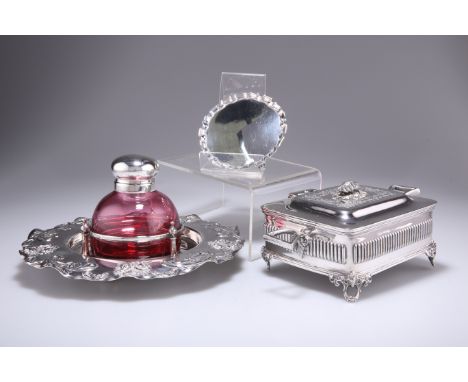 A GEORGE V SMALL SILVER WAITER,&nbsp;by Henry Hodson Plante, London 1935, with Chippendale rim, raised on three scroll feet, 