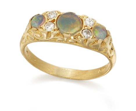 AN 18 CARAT GOLD OPAL AND DIAMOND RING,&nbsp;three graduated round opals spaced by diamond accents, to a carved gallery, tota