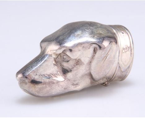 A SILVER NOVELTY VESTA CASE, import marks, C M E Jewellery Ltd, in the form of the head of a dog. 5.2cm long, 1.1 troy ounces