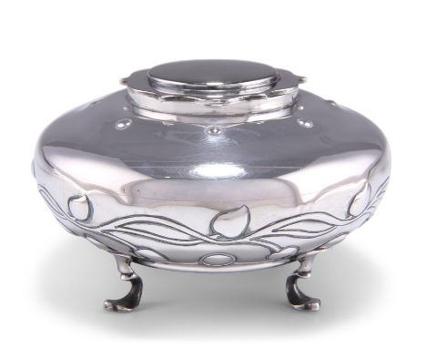 AN ART NOUVEAU SILVER INKWELL, by Harrison & Sons, Birmingham 1909, squat baluster with shaped hinged cover, the body embosse