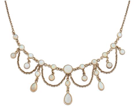 AN EDWARDIAN STYLE OPAL NECKLACE, graduated round opals in bezel settings, suspend round and pear opal drops, spaced by chain