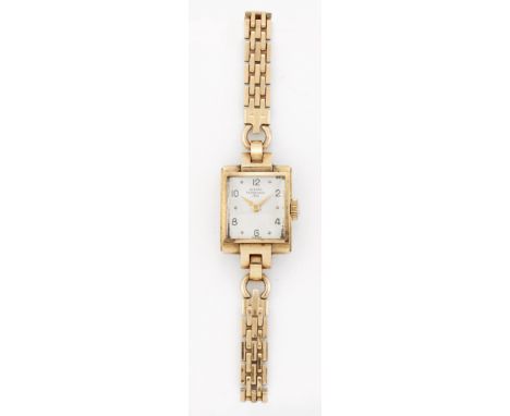 A LADY'S GIRARD PERREGAUX BRACELET WATCH,&nbsp;rectangular silver dial with alternate Arabic and dot indices and gilt sword h