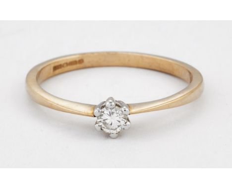 A 9 CARAT GOLD SOLITAIRE DIAMOND RING, a round brilliant-cut diamond in a claw setting, to knife-edge shoulders, estimated di