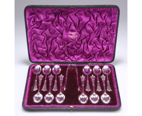 A SET OF TWELVE VICTORIAN SILVER TEASPOONS AND TONGS, by David & George Edward, London 1891 and 1892, the double-struck handl