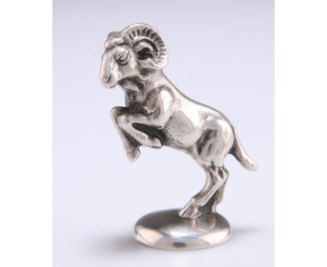 A CONTINENTAL 800 GRADE SILVER MODEL OF A GOAT, cast rearing, stamped 800. 5.8cm high