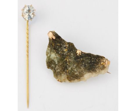 A ROCK CRYSTAL STICK PIN, a cushion-cut rock crystal in a claw setting, 2.6 grams; and&nbsp;A VICTORIAN GOLD IN QUARTZ ROCK B