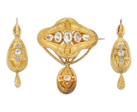 A MID 19TH CENTURY BROOCH AND EARRINGS SUITE, the brooch set with graduated oval-cut pale blue stones within a lozenge shaped