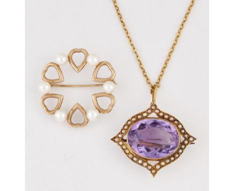 AN AMETHYST AND SEED PEARL BROOCH, an oval-cut amethyst within a lozenge-shaped frame set with seed pearls, measures 2.5cm by