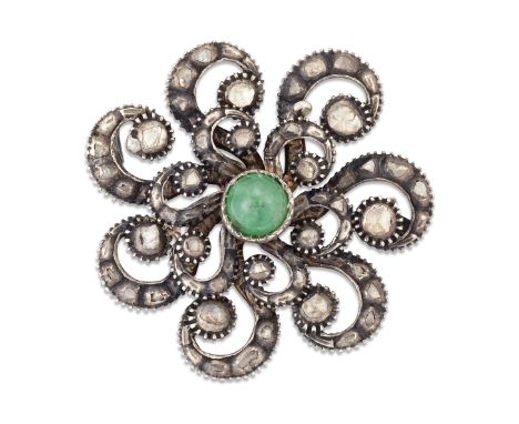 A LATE 18TH/EARLY 19TH CENTURY EMERALD AND DIAMOND BROOCH, a round cabochon emerald within a stylised scrolling frame, set th