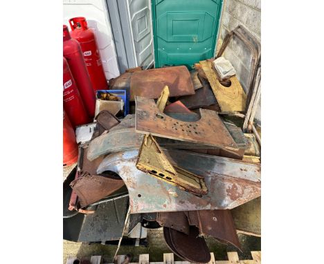 A large quantity of Ford Model T sheet metal parts inc. wings, sills etc. 