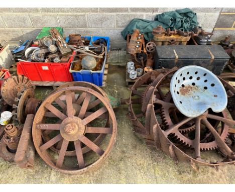 A Ford Model T tractor lot including conversion rear wheels and drive axle possibly by Shaw,&nbsp; engines, pistons, parts et