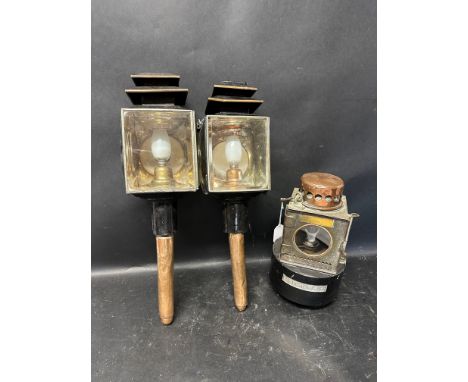 A Felixstowe boat lantern and two carriage lamps. 