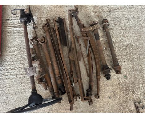 A selection of axle and suspension components, propshafts and steering column to suit vintage cars, believed to be Austin.