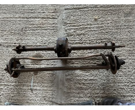 A front and rear axle for vintage car, believed to be Austin 7.