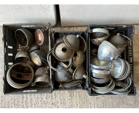 Three trays of assorted lamp spares to include Lucas etc. 