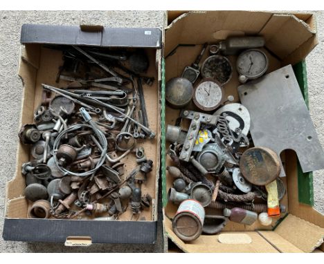 Two boxes of assorted vintage car spares to include AA and RAC car and motorcycle badges, caps etc. 