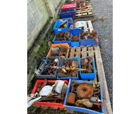 Four pallets of Ford Model T parts inc. front axles, dry shafts, engine parts etc. 