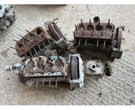 Three Austin 7 engine blocks. 