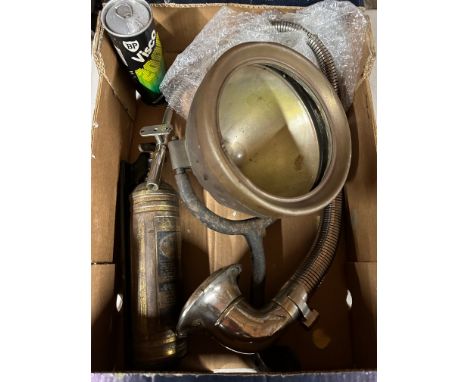 A tray of parts to include a large car headlamp, constrictor horn, pyrene extinguisher (dispay purpose only) and BP oil tin. 