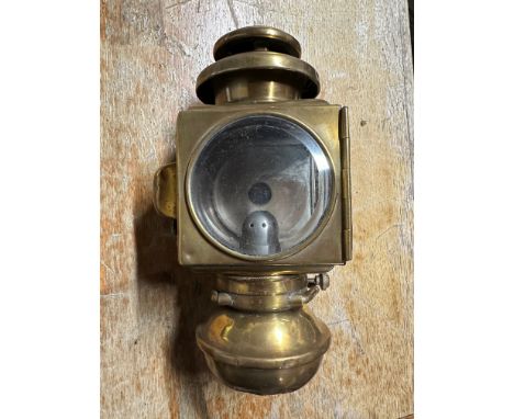 An Edwardian car lamp. 