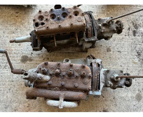 Two Austin 7 engine blocks with gearboxes. 