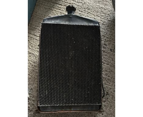 A vintage Bentley radiator.