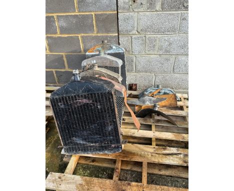 Five Ford Model T radiators with parts, various conditions. 