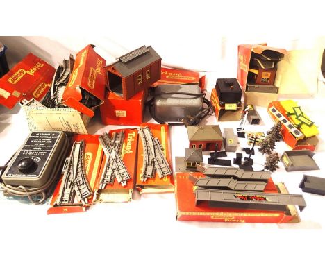 Selection of early Triang grey plastic track, points, controllers, buildings including station, engine shed etc, mostly in go