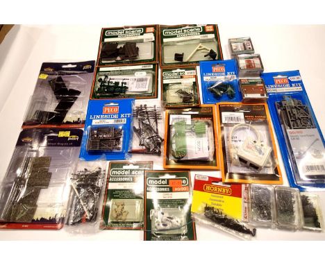 Collection of OO scale accessories; yard crane kit, animals, fences, telegraph poles, electrics etc. MOstly new inpackets wit