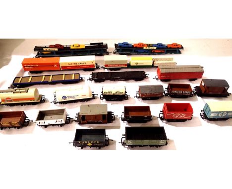 Twenty one OO scale wagons including  two motorail car transports (one missing bogie) mostly in good condition, unboxed. P&am