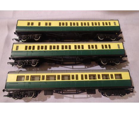 Three Hornby Thomas The Tank Gordons coaches, x2 composite and x1 brake end. One coupling missing otherwise in very good cond