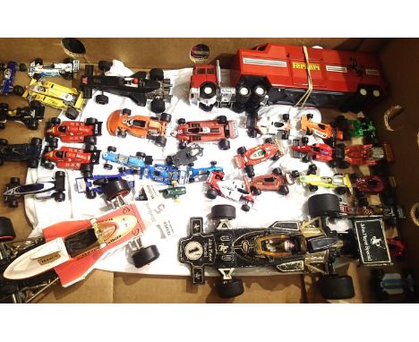 Approximately thirty Formula one related diecast vehicles,  Polisitil, Matchbox etc, all playworn and Scalextric car. P&amp;P