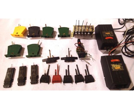 Two Hornby controllers, six switches, six switch console, three point motors, track connectors, electric signal, mostly in go