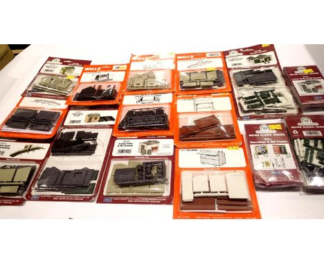 Collection of Wills plastic OO gauge building kits to include petrol station, coal hut, signal box, platform halt etc. All ne