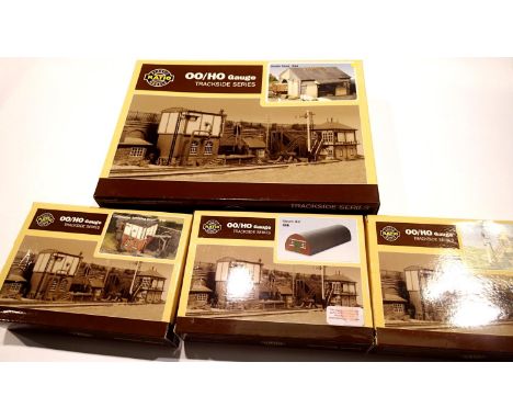 Four ratio OO scale plastic kits; servicing depo, Nissan hut, signal box and goods shed, all new in boxes. P&amp;P Group 1 (£