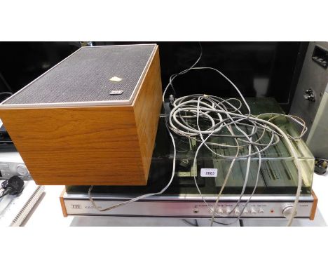 An ITT KA2015 turntable with stereo tuner player amplifier, and speaker. (AF)