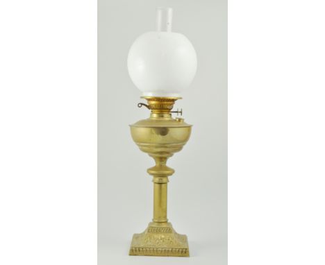 Brass oil lamp,  brass magazine rack and other various metalware.