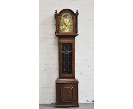 Contemporary oak longcase clock, arched brass dial, signed Fenclocks, Suffolk, with a moon faced lunette, three chain movemen