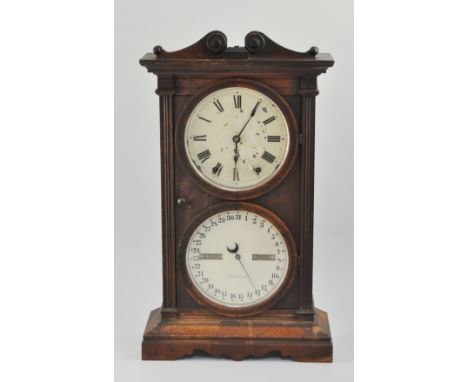 American walnut cased double dial shelf clock by 'Seth Thomas', conventional dial over a date dial, with day and month apertu