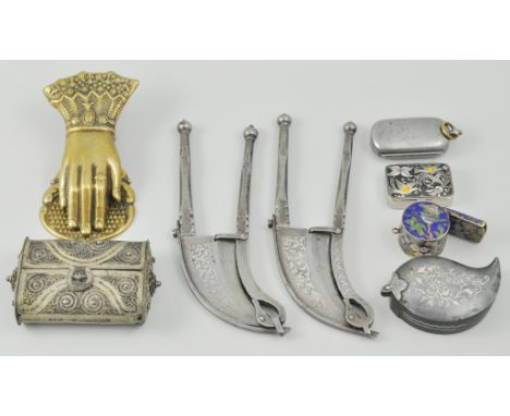 Indian white metal filigree box, a brass door knocker in the shape of a hand and other items, various, (1 box).