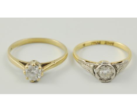 9ct gold diamond solitaire ring, and an 18ct and platinum diamond ring (2).