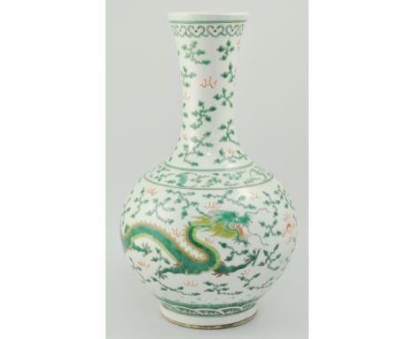 Chinese famille verte vase, decorated with two dragons and a flaming pearl, six character mark, 42cms.